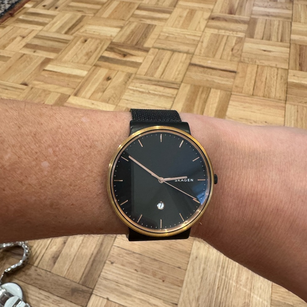 Skagen Black Dial with Gold Trim Watch for women or unisex. Adjustable strap